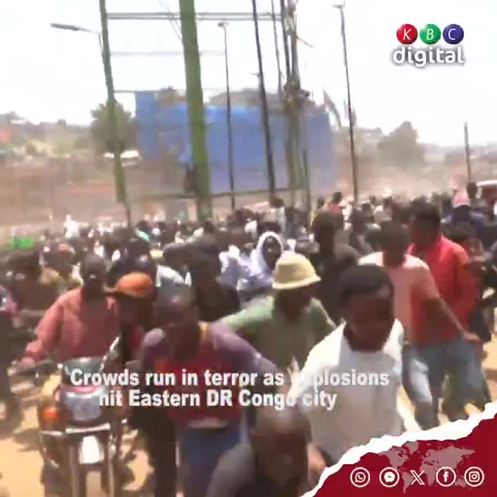 Hundreds of people run, some carrying injured, amidst chaotic scenes in Eastern DR Congo city of Bukavu which was hit by at least two explosions at rally held by the M23 armed group