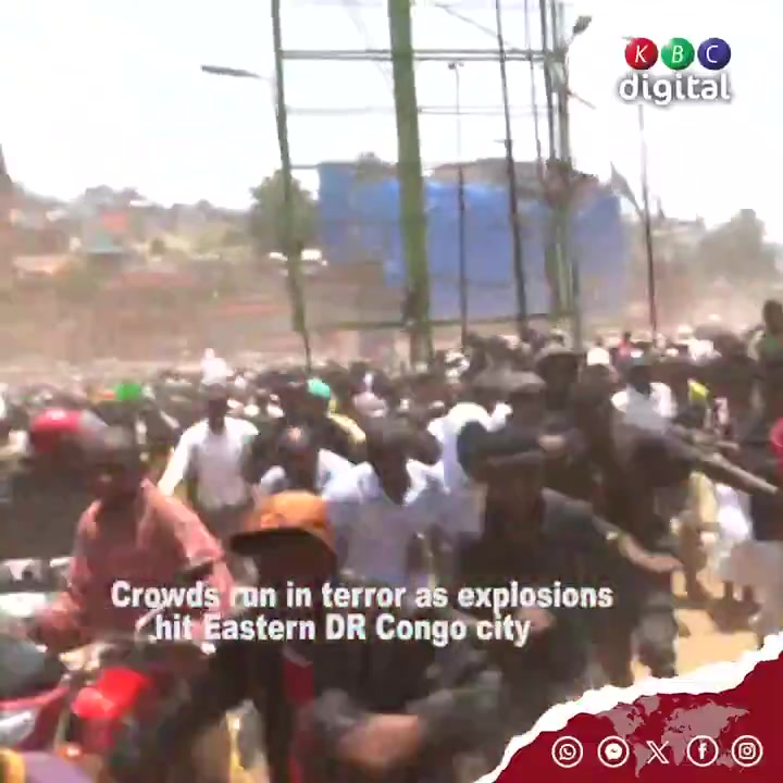 Hundreds of people run, some carrying injured, amidst chaotic scenes in Eastern DR Congo city of Bukavu which was hit by at least two explosions at rally held by the M23 armed group